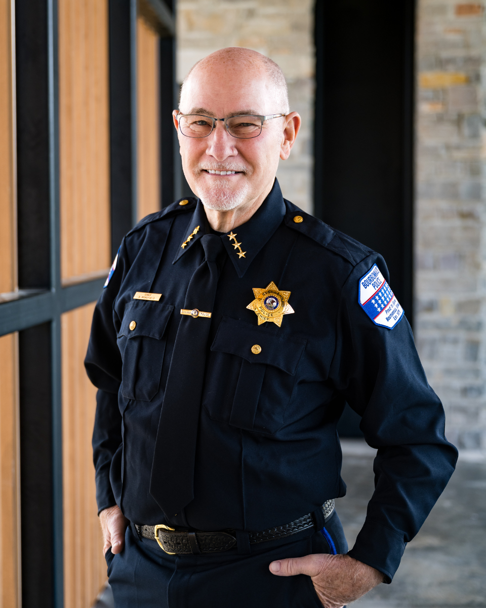 bourbonnais police officer with child during shop with a cop at target